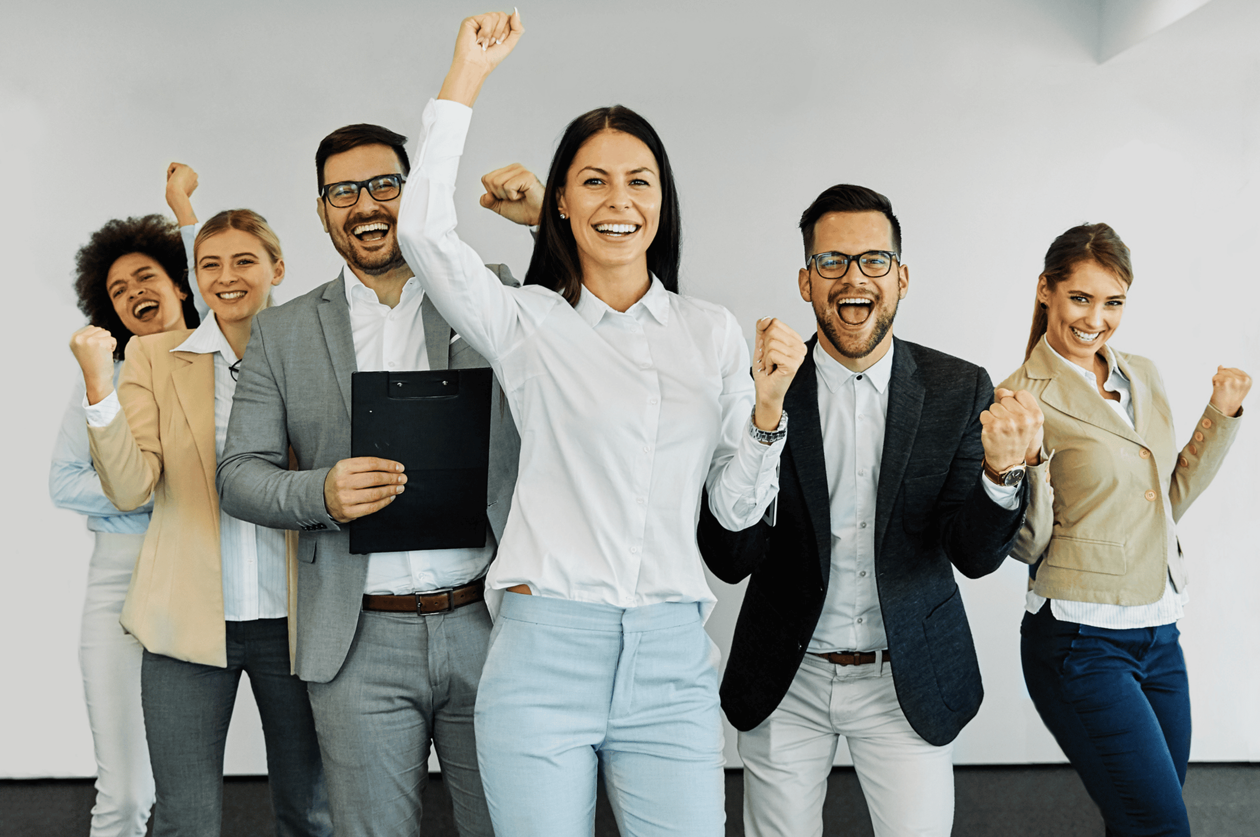 Group of professionals celebrating with enthusiasm.